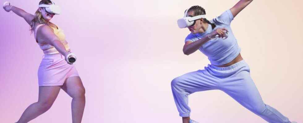 Two people dancing around using the Oculus Quest 2 on a pink gradient background