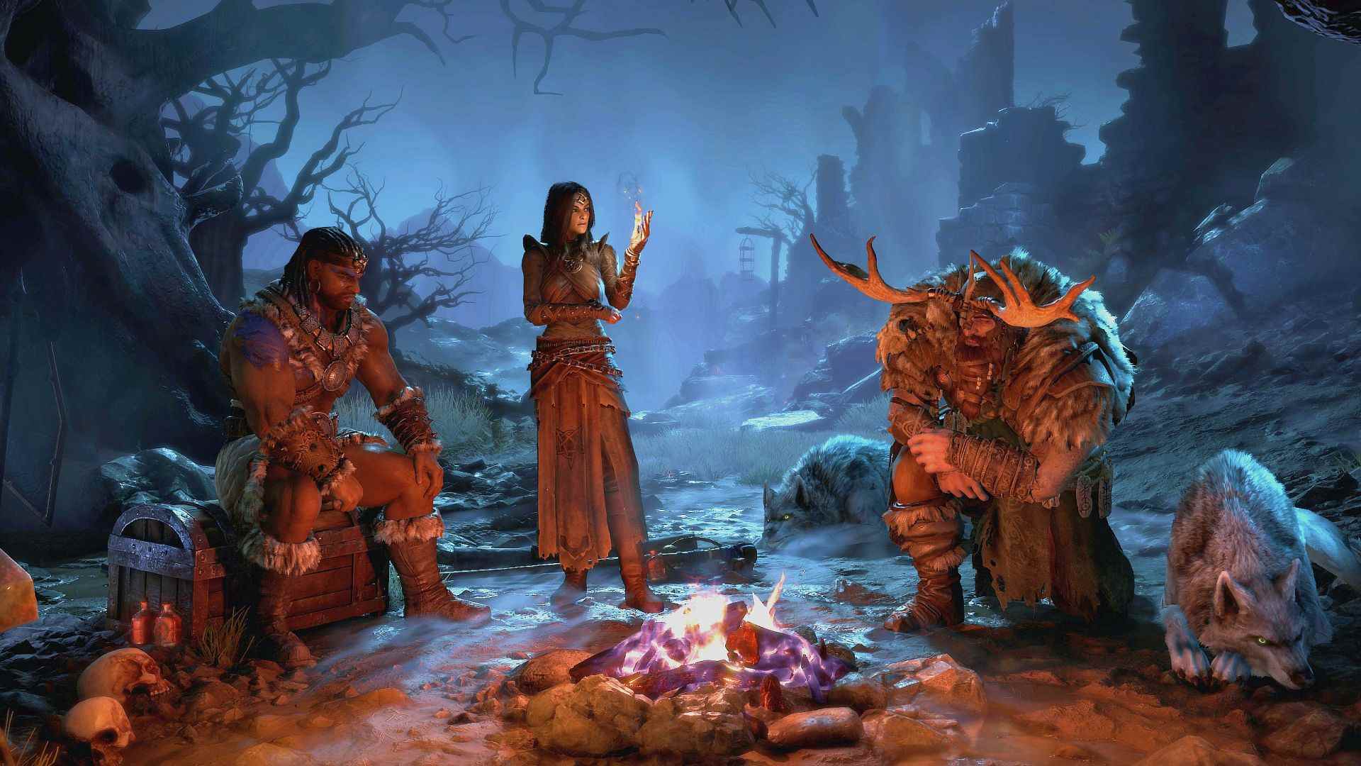 Date de sortie de Diablo 4 : trois des cinq personnages révélés assis près d'un feu de camp.