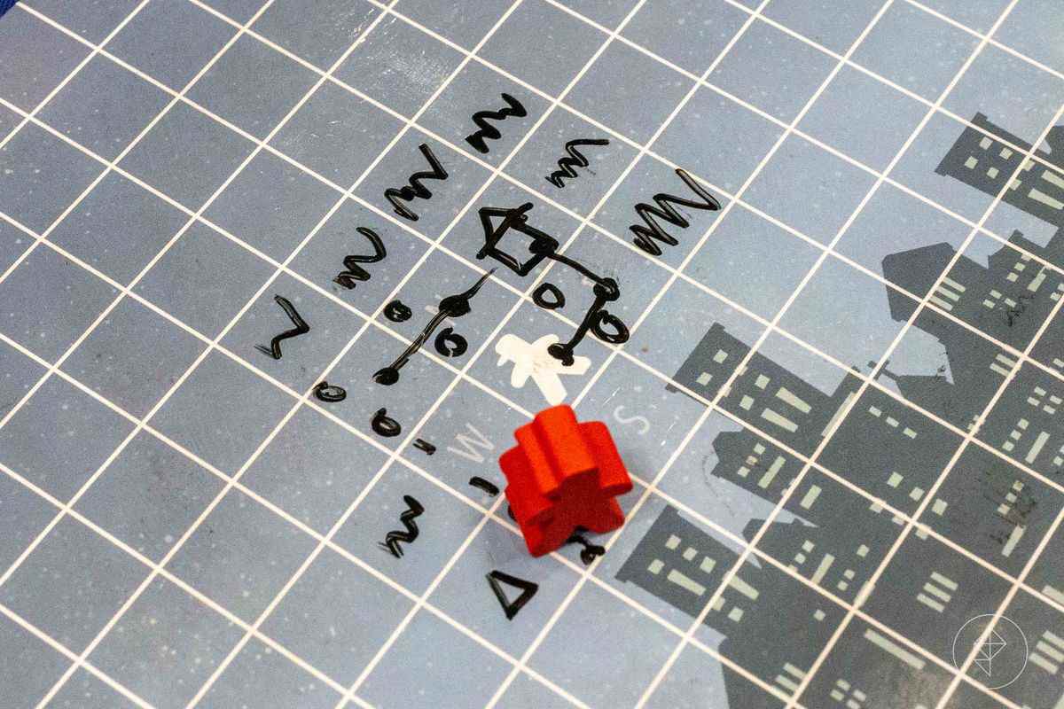 La carte d'un joueur, griffonnée sur une grille vierge.