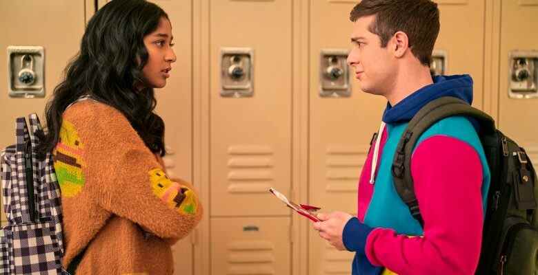 A teen boy and girl confront each other in front of the lockers; still from "Never Have I Ever."