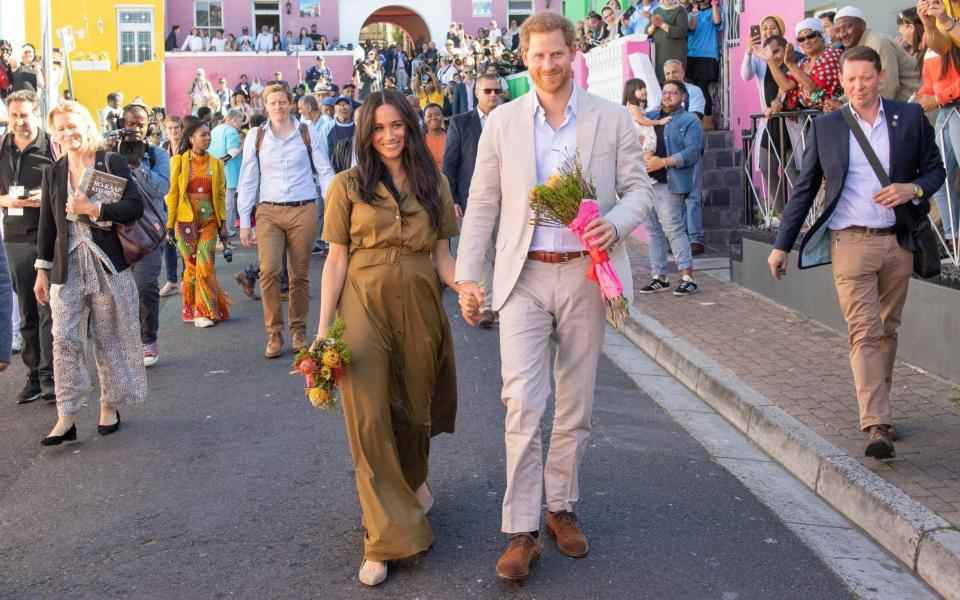 Le prince Harry et Meghan, duchesse de Sussex, assistent aux célébrations des jours fériés au Cap lors de leur tournée en Afrique du Sud en 2019 - Pool/Samir Hussein/Getty Images