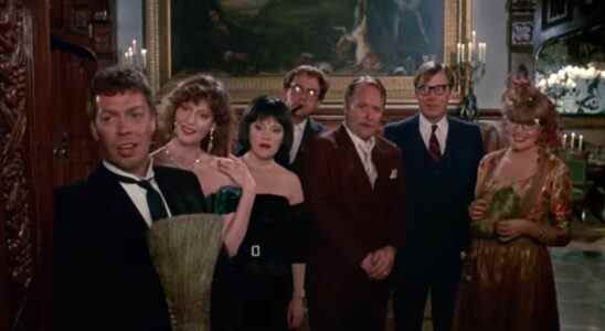 The cast of Clue greeting an unexpected guest