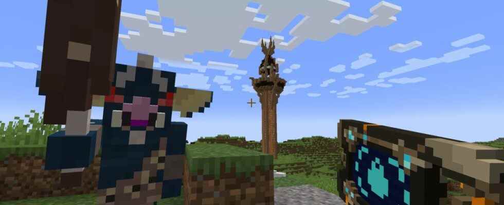 Minecraft - A player holds a modded Sheikah Slate while looking at a blue Bokoblin from Zelda, with a Sheikah tower in the background.