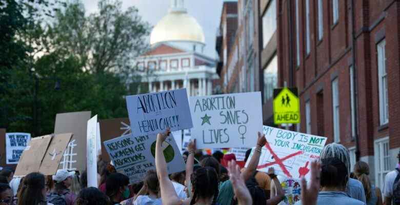 Demonstrators march while holding placards expressing their opinion during the rally. Following the Supreme Court's reversal of Roe V Wade, pro-choice rallies were held in cities across the United States. (Photo by Vincent Ricci / SOPA Images/Sipa USA)(Sipa via AP Images)