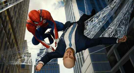 Spider-Man webbing someone up