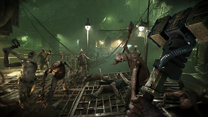 Aperçu de Darktide - de nombreux zombies chargeant le joueur dans une pièce aux teintes vertes