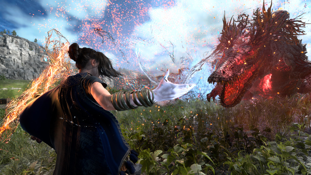 Frey, une jeune femme, invoque un sort magique dans un champ vert face à un monstre rouge ressemblant à un dragon qui charge