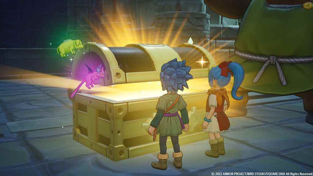 Mia et Erik, deux jeunes héros aux cheveux bleus, se tiennent devant un coffre au trésor géant qui s'ouvre, d'où jaillit une lumière dorée