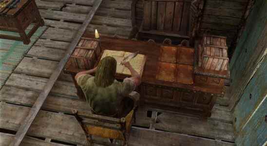 Man sitting at a desk in Skyrim