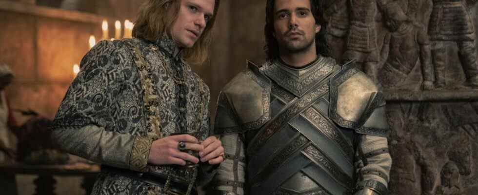 Left Solly McLeod as Ser Joffrey Lonmouth standing next to Fabien Frankel as Ser Criston Cole who is starring blankly forward in Episode 5 of House of the Dragon.