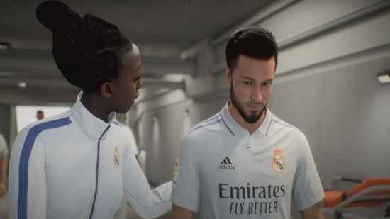 Mode Carrière de FIFA 23 : un footballeur vêtu d'un maillot blanc parle à son entraîneur