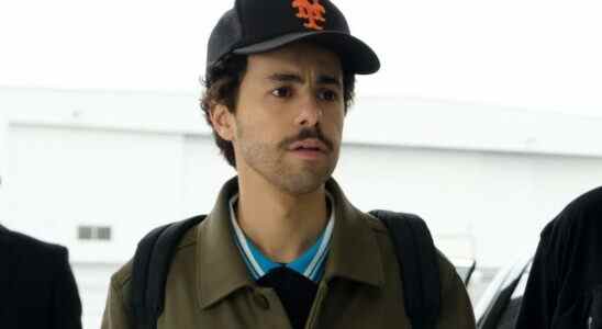 Close up of a man with a mustache wearing a baseball cap; still from "Ramy."