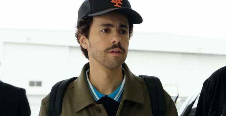 Close up of a man with a mustache wearing a baseball cap; still from "Ramy."