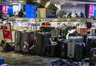 Bagages non réclamés au Terminal 3 Canada Arrivées à l'aéroport international Pearson de Toronto le mardi 5 juillet 2022.  