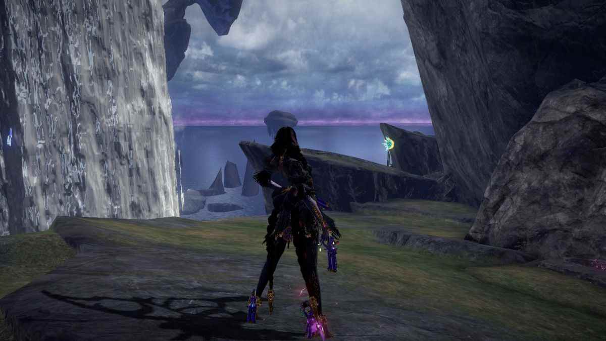 Bayonetta se dresse sur une falaise et regarde l'horizon dans Bayonetta 3.