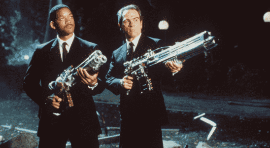 Will Smith and Tommy Lee Jones aim at an alien in Men in Black