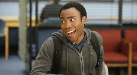 Donald Glover smiling as Troy Barnes in Community