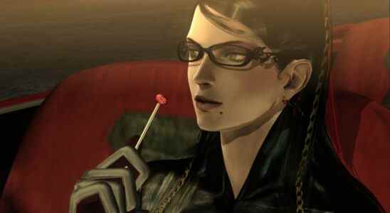 bayonetta looking off to side while holding a sucker