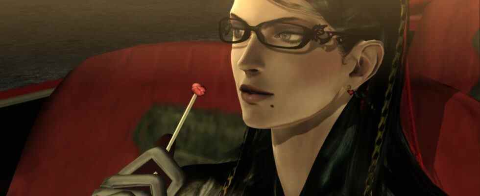 bayonetta looking off to side while holding a sucker