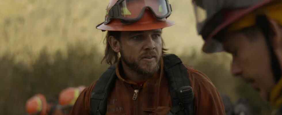 Max Thieriot as Bode talking with his captain on Fire Country.