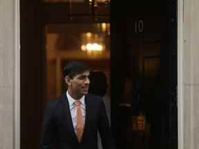 Sur cette photo d'archive, le nouveau chancelier britannique de l'Échiquier Rishi Sunak quitte le 10 Downing Street, où il a été nommé par le Premier ministre britannique Boris Johnson, à Londres, le 13 février 2020.