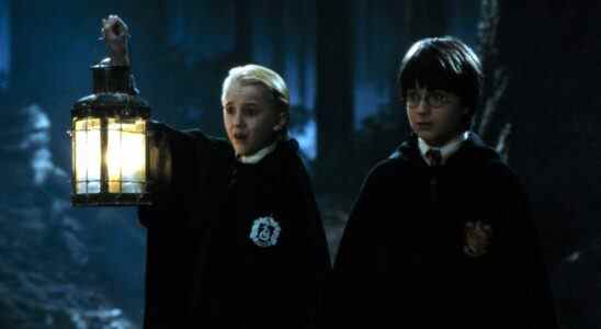Tom Felton and Daniel Radcliffe as Draco and Harry Potter in Sorcerer