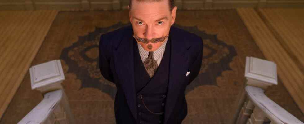 Kenneth Branagh stares ominously on a staircase in Death on the Nile.
