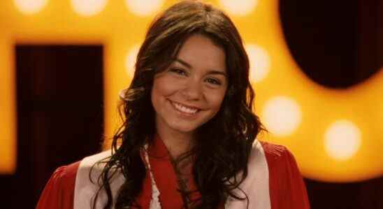 Vanessa Hudgens in High School Musical 3 smiling at the camera in a graduation robe.