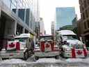 Des camions bloquent les rues du centre-ville le 4 février 2022 à Ottawa.  La ville aurait-elle dû être mieux préparée à cela ?    