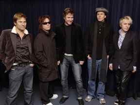Duran Duran -- De gauche à droite ;  Roger Taylor, Andy Taylor, Simon LeBon, John Tayloer et Nick Rhodes -- pose pour une 