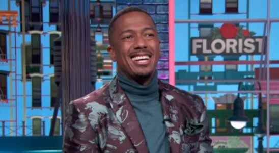Nick Cannon in colorful jacket on his talk show