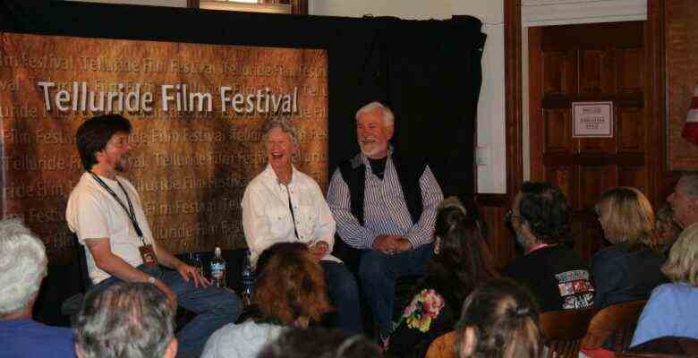 Bill & Stella Pence with Ken Burns (left) at the Telluride Film Festival on the day that they announced their departure from the Festival in 2006. Photo by Eugene Hernandez