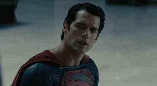 Henry Cavill speaking as he stands in the train station in Man of Steel.