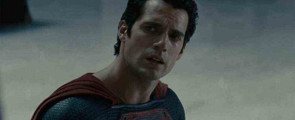 Henry Cavill speaking as he stands in the train station in Man of Steel.