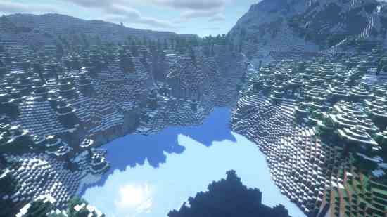 Minecraft Christmas seeds - 5488656216511509290 : les rayons du soleil se déversent sur les montagnes enneigées et un lac gelé