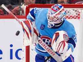 Sam Montembeault des Canadiens effectue un arrêt du bloqueur lors de la troisième période d'un match de la Ligue nationale de hockey contre le Seattle Kraken à Montréal le lundi 9 janvier 2023.