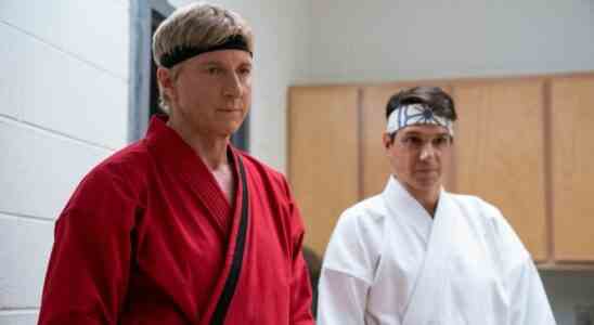William Zabka and Ralph Macchio in red and white karate uniforms respectively