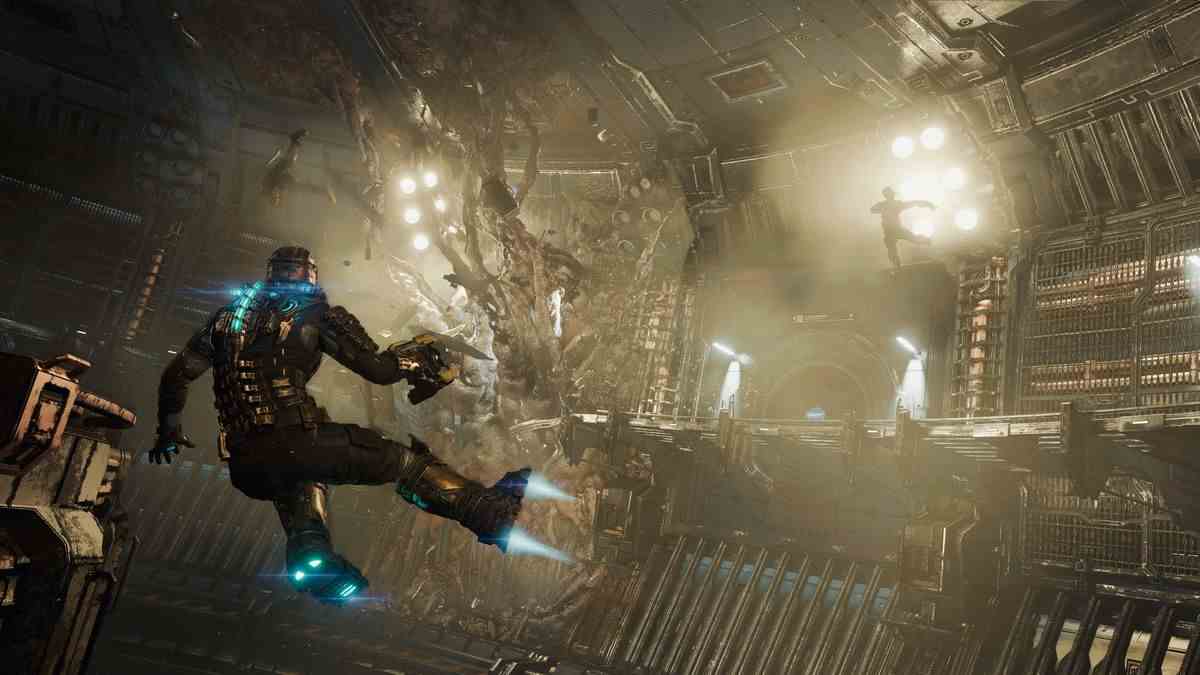Isaac Clarke flotte dans une chambre ouverte qui a été envahie par des vrilles extraterrestres organiques dans une capture d'écran du remake de 2023 de Dead Space