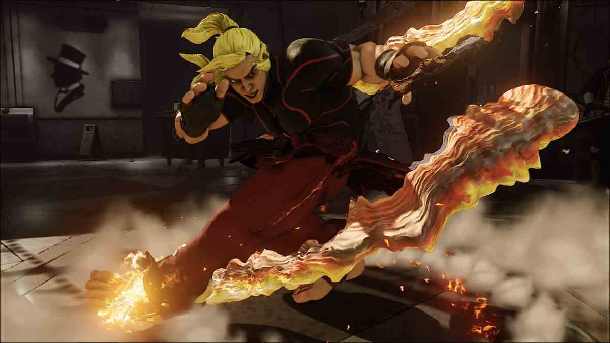 Ken de Street Fighter 5 tire du feu de ses mains et de ses pieds alors qu'il exécute un coup de pied aérien
