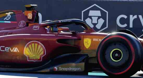 A screenshot of a Ferrari from the side taken in F1 22