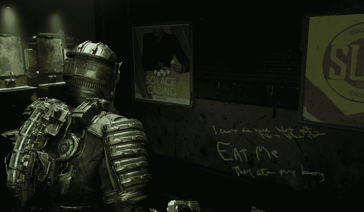 Dead Space - Isaac regarde les graffitis écrits sur les murs de l'USG Ishimura, qui disent : « Je ne peux pas mourir.  Pas ici.  Pas comme ça.