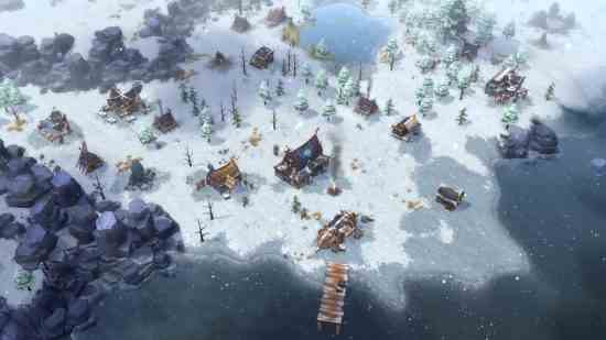 Les meilleurs jeux comme Age of Empires - un village viking près de la côte enneigée de Northgard.