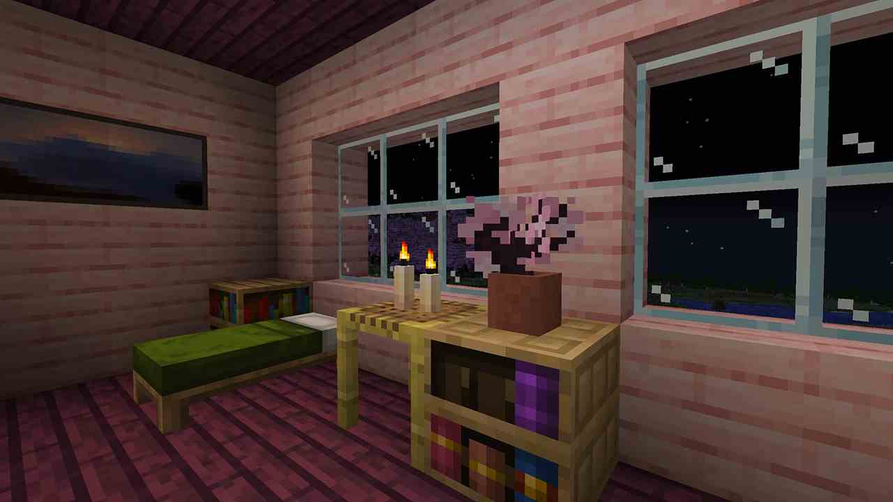 Minecraft - une petite maison en bois rose avec un petit arbre de fleurs de cerisier dans un pot