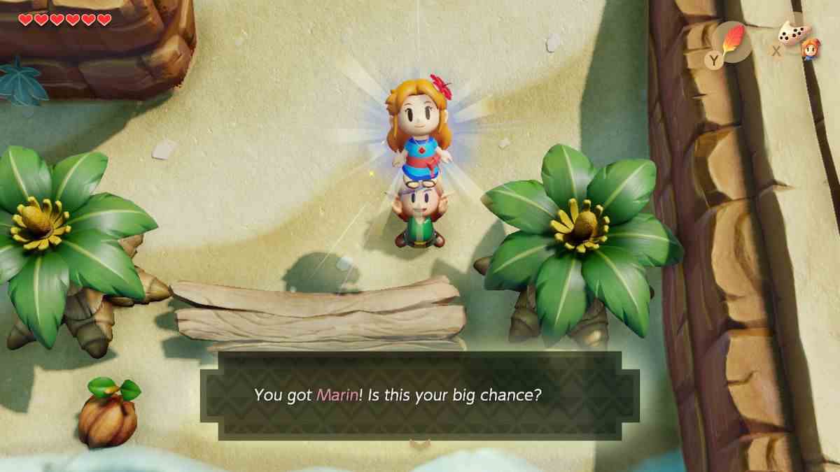 Link hisse Marin au-dessus de sa tête comme s'il s'agissait d'un nouvel objet dans le remake de The Legend of Zelda : Link's Awakening