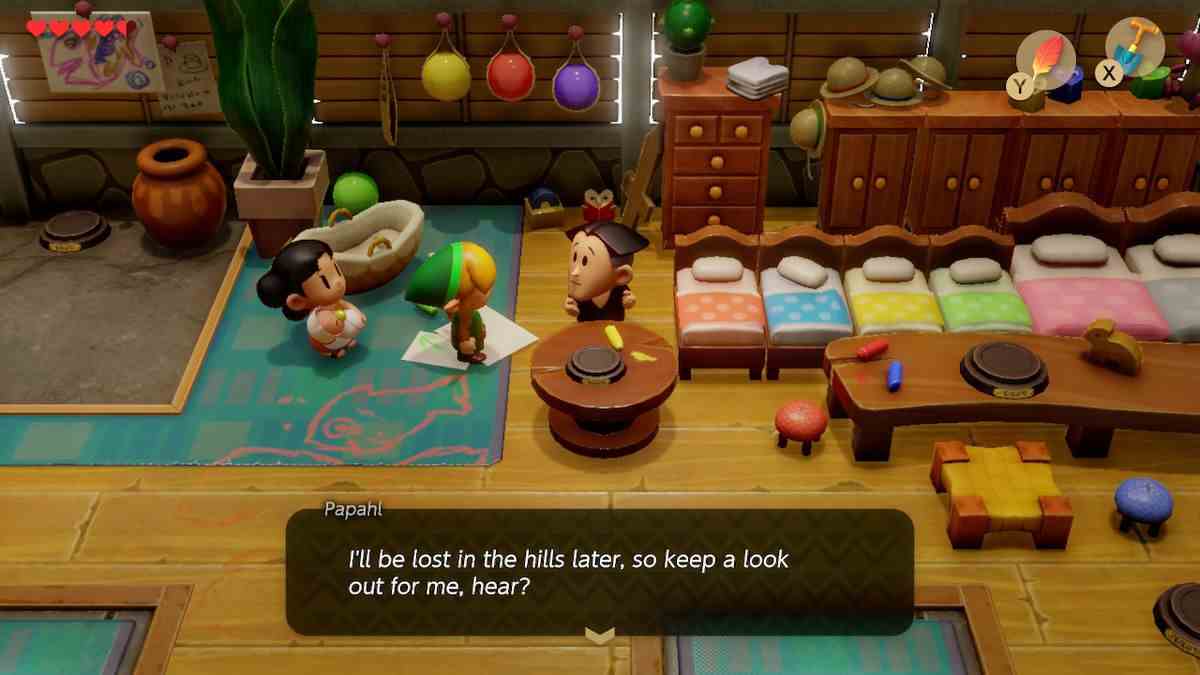 Lijnk parle à Papahl dans sa maison dans le remake de The Legend of Zelda: Link's Awakening