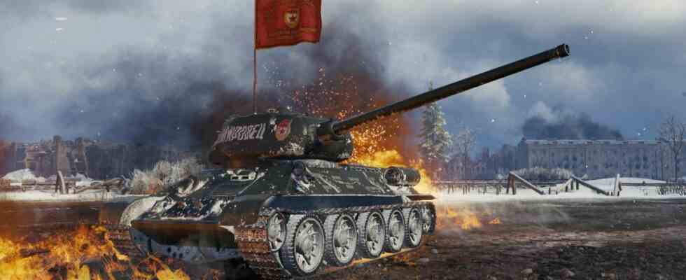 A soviet tank waving a banner against an explosion