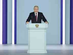 Le président russe Vladimir Poutine prononce son discours annuel sur l'état de la nation au centre de conférence Gostiny Dvor, dans le centre de Moscou, le 21 février 2023. (Photo de Sergei SAVOSTYANOV / SPUTNIK / AFP)