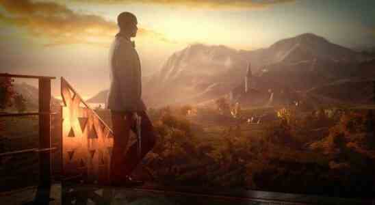 Agent 47 walks in profile, holding a pistol and looking away from the camera towards sunlit mountains in the background.