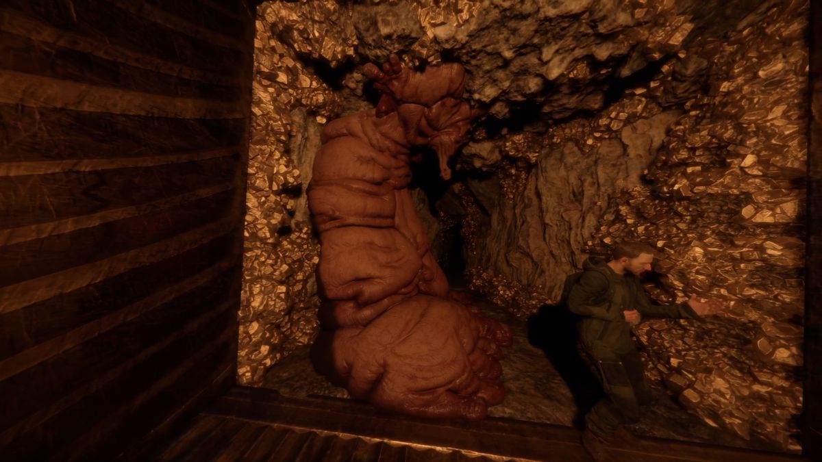 Monstruosité mutante dans une grotte pleine d'or et un autre humain dans Sons of the Forest