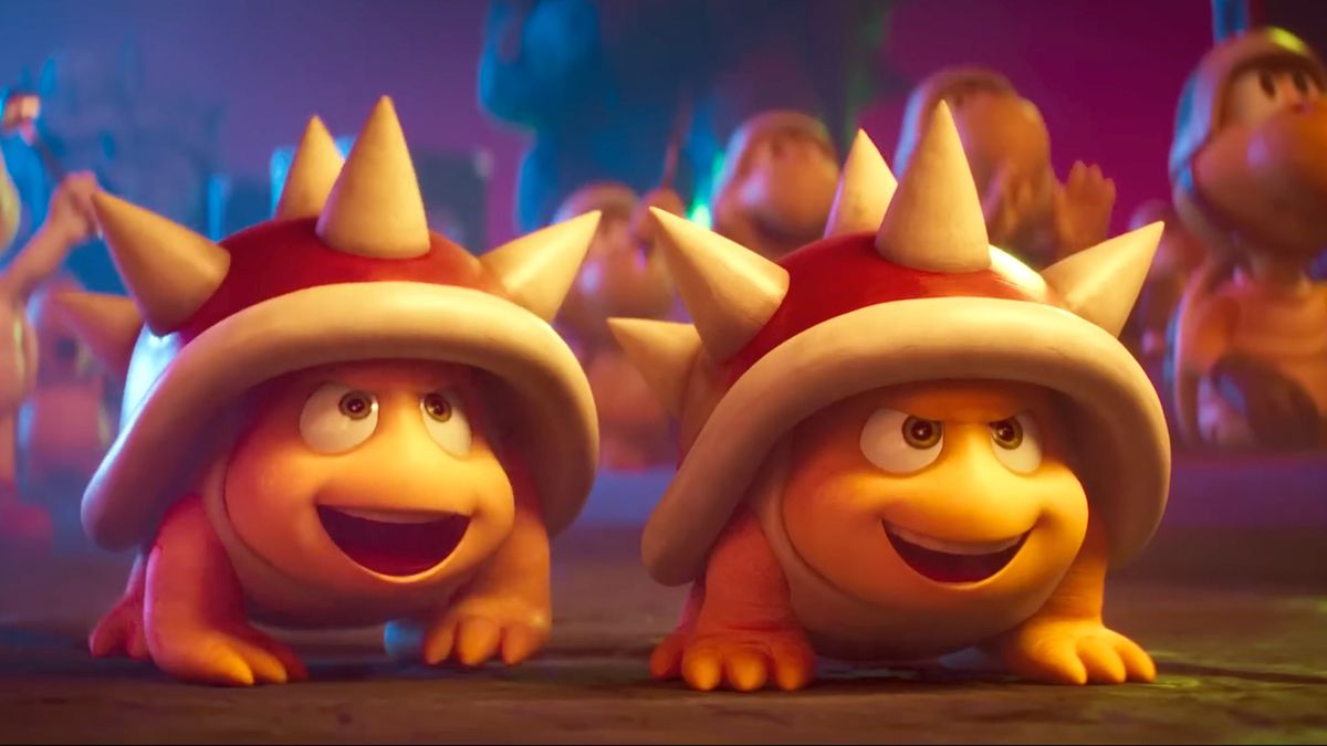Deux Spinys souriants regardent Bowser dans une image du film Super Mario Bros.